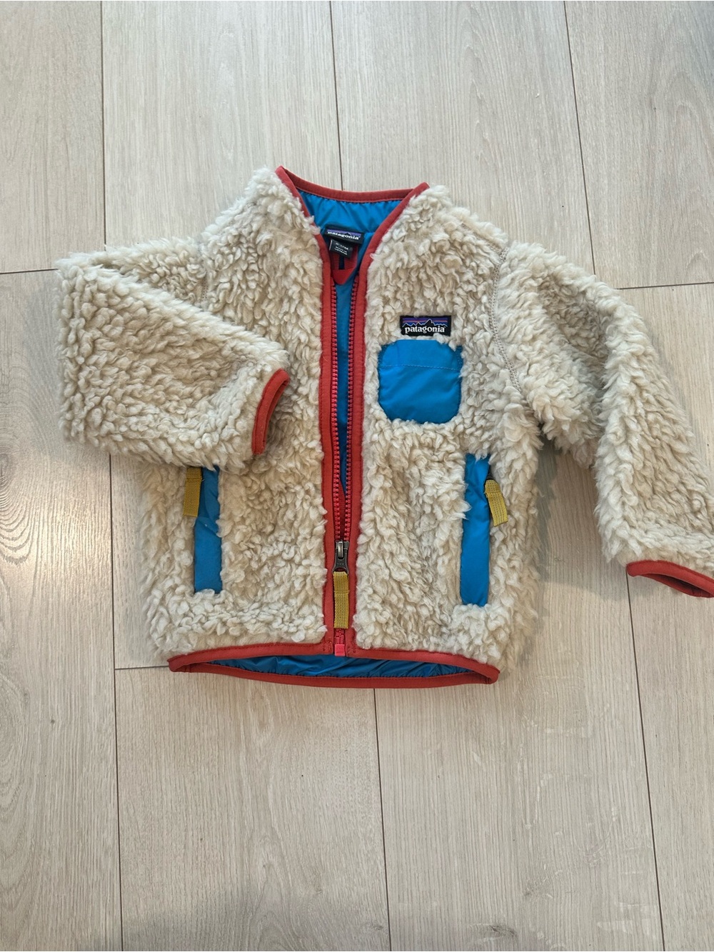 Patagonia Baby/Toddler Cream Sherpa Jacket with Blue and Orange/Red Trim